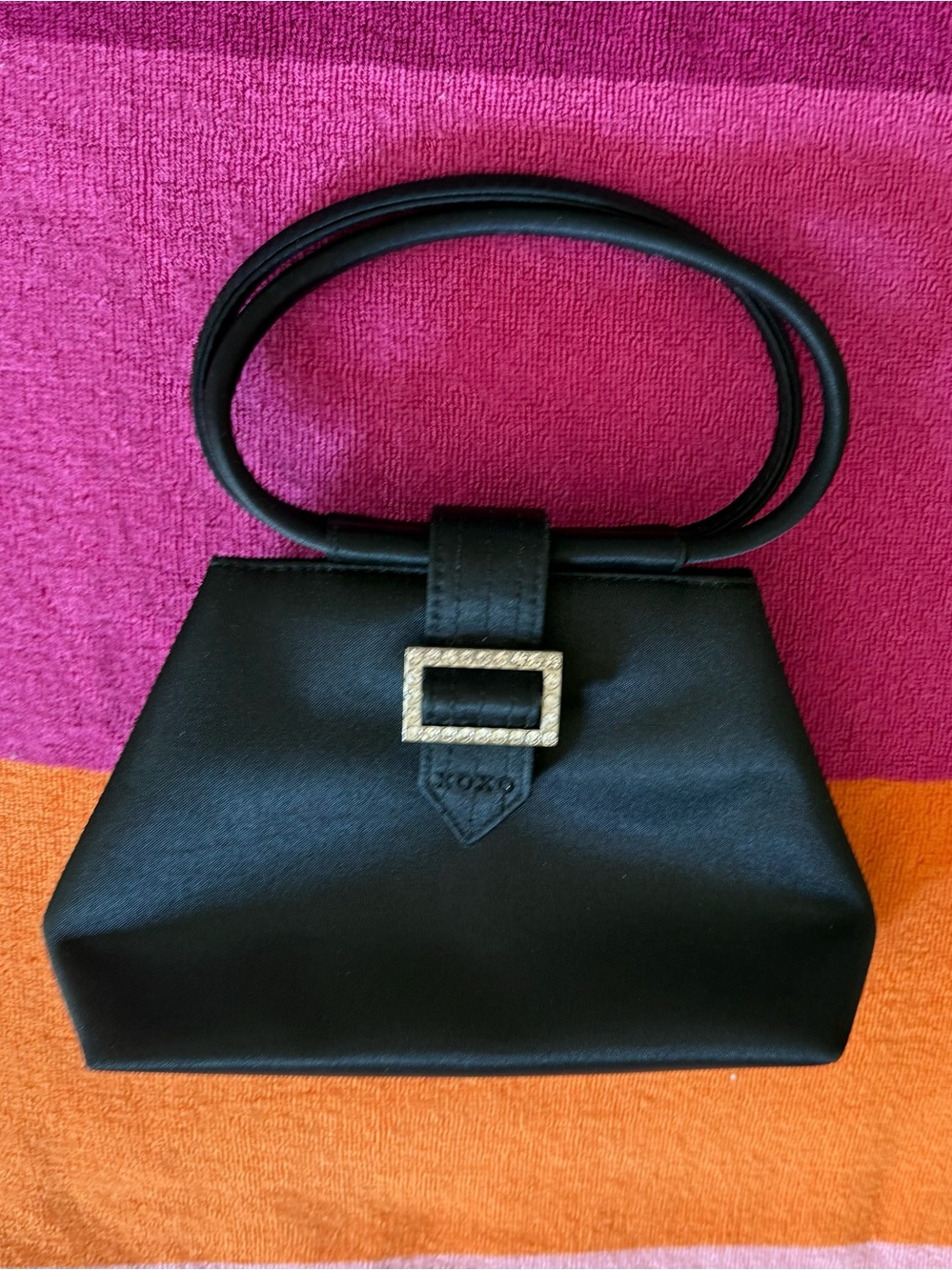 XOXO little party handbag, black fabric with rhinestone buckle almost new